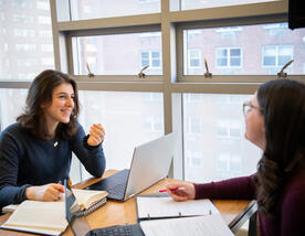 Two students conversing in the beit midrash